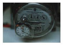 A kilowatt-hour meter turning backwards